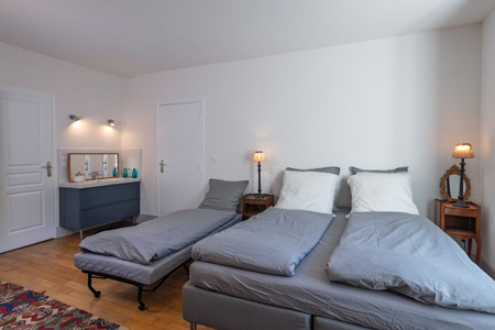 Chambre d’une suite-appart champêtre à Mauffans